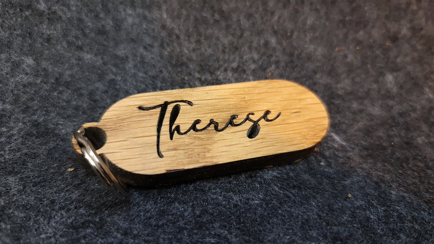 Personlig nyckelring i trä